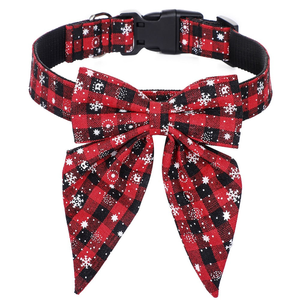 Dog wearing Christmas bow-tie collar