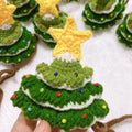 Knitted Christmas tree hat on a pet